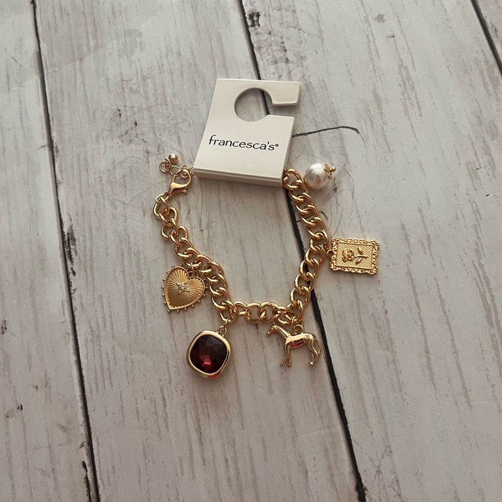 Francesca's Collections Gold Bracelet with Red Gem and Charms - Picture 4 of 4